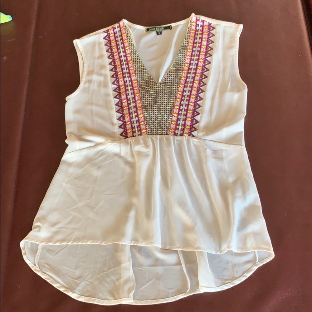 Love Stitch sleeveless high-low top